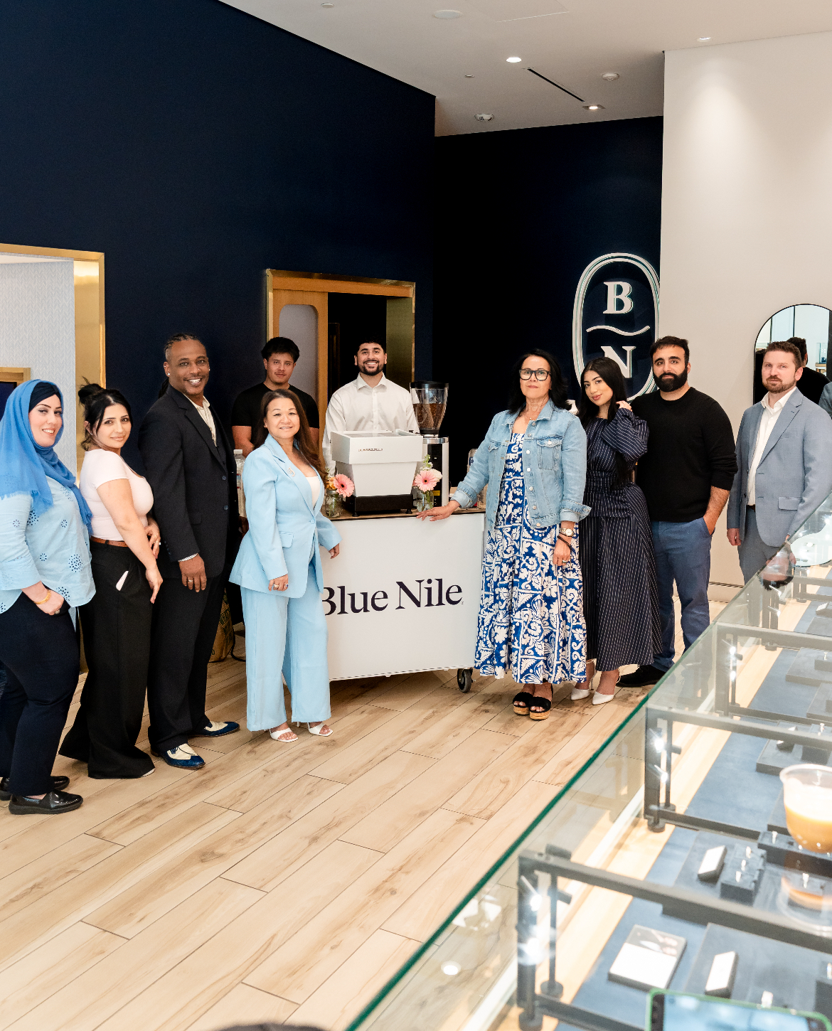 Fez Coffee barista crafting espresso drinks at the Blue Nile grand opening activation