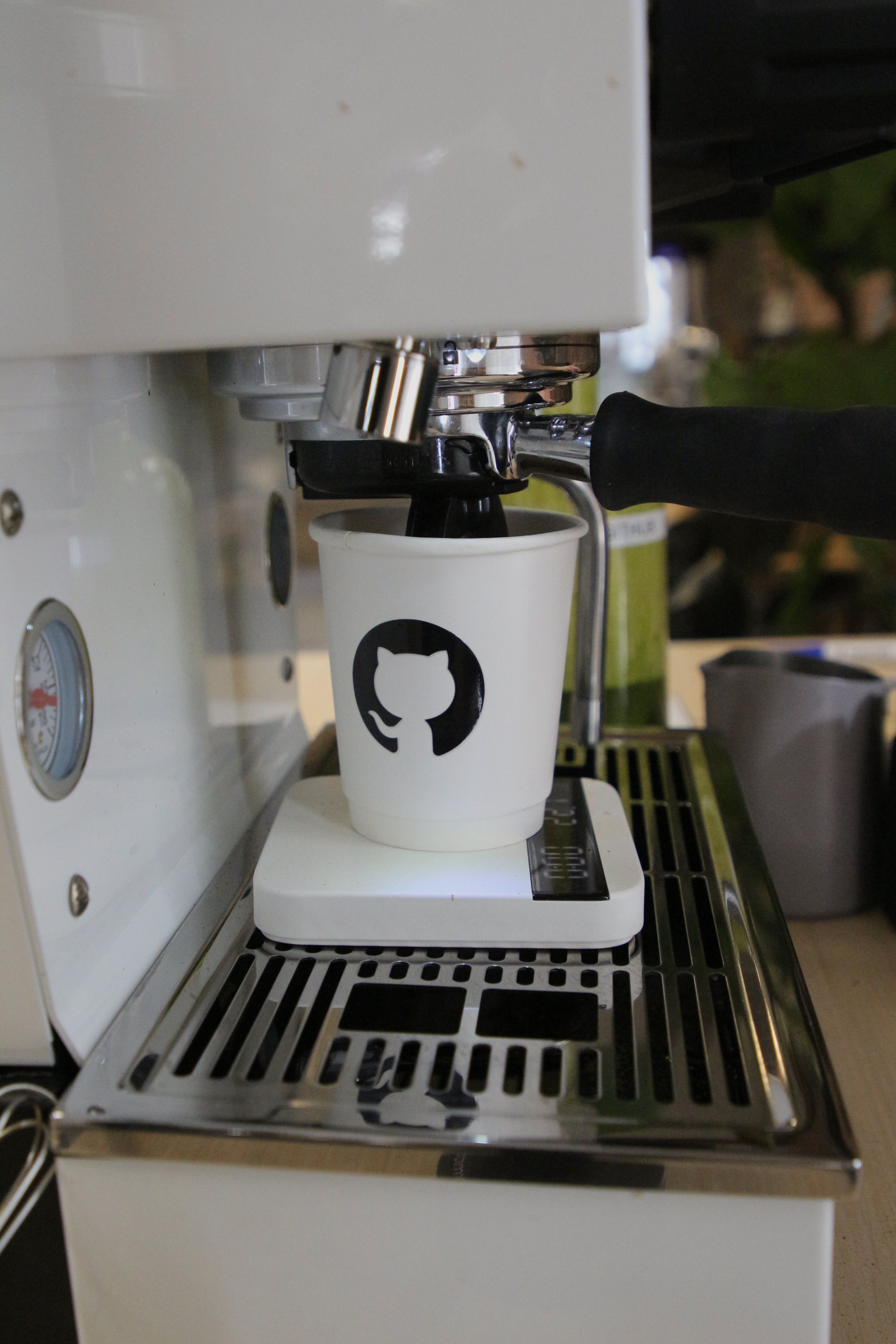 Commercial espresso machine on the Fez Coffee cart at the GitHub brand activation.